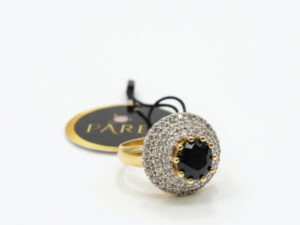 GOLD PLATED RING WITH A BLACK STON